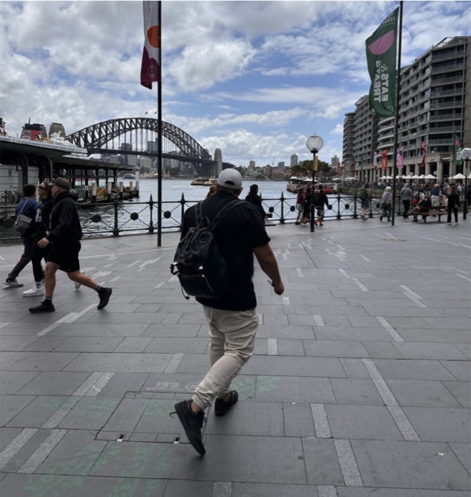Paul walking along Circular Quay in Sydney