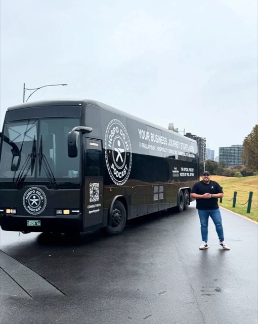 Paul beside the Hospo Dojo Podcast tour bus