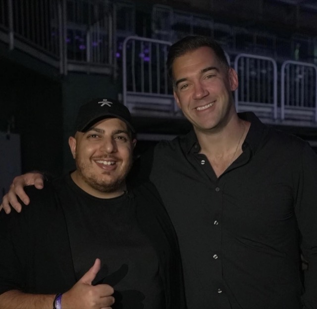 Paul with a fellow speaker backstage at an event