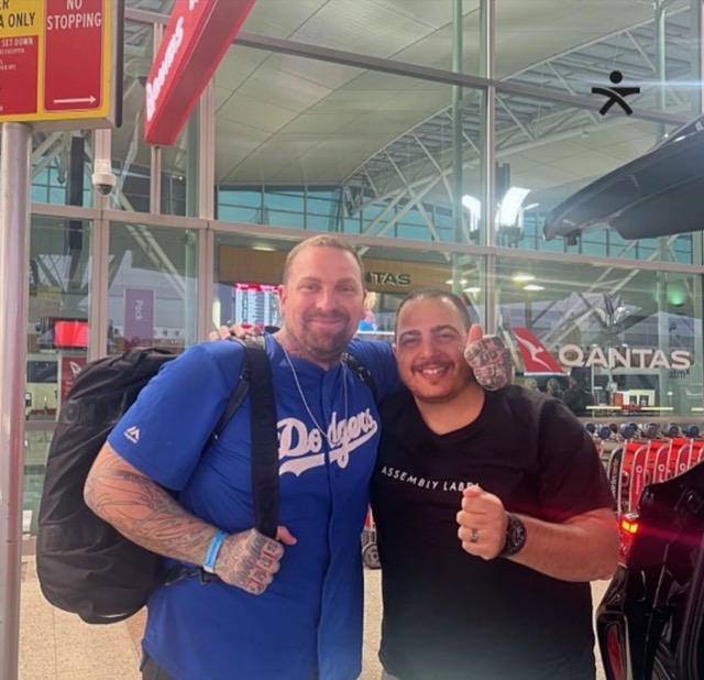 Paul meeting an operator at the airport
