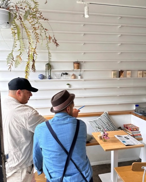 Paul working through a café fit-out with the owner
