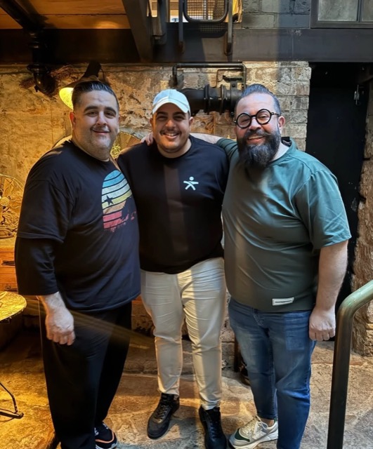 Paul with two operators in a sandstone cellar venue